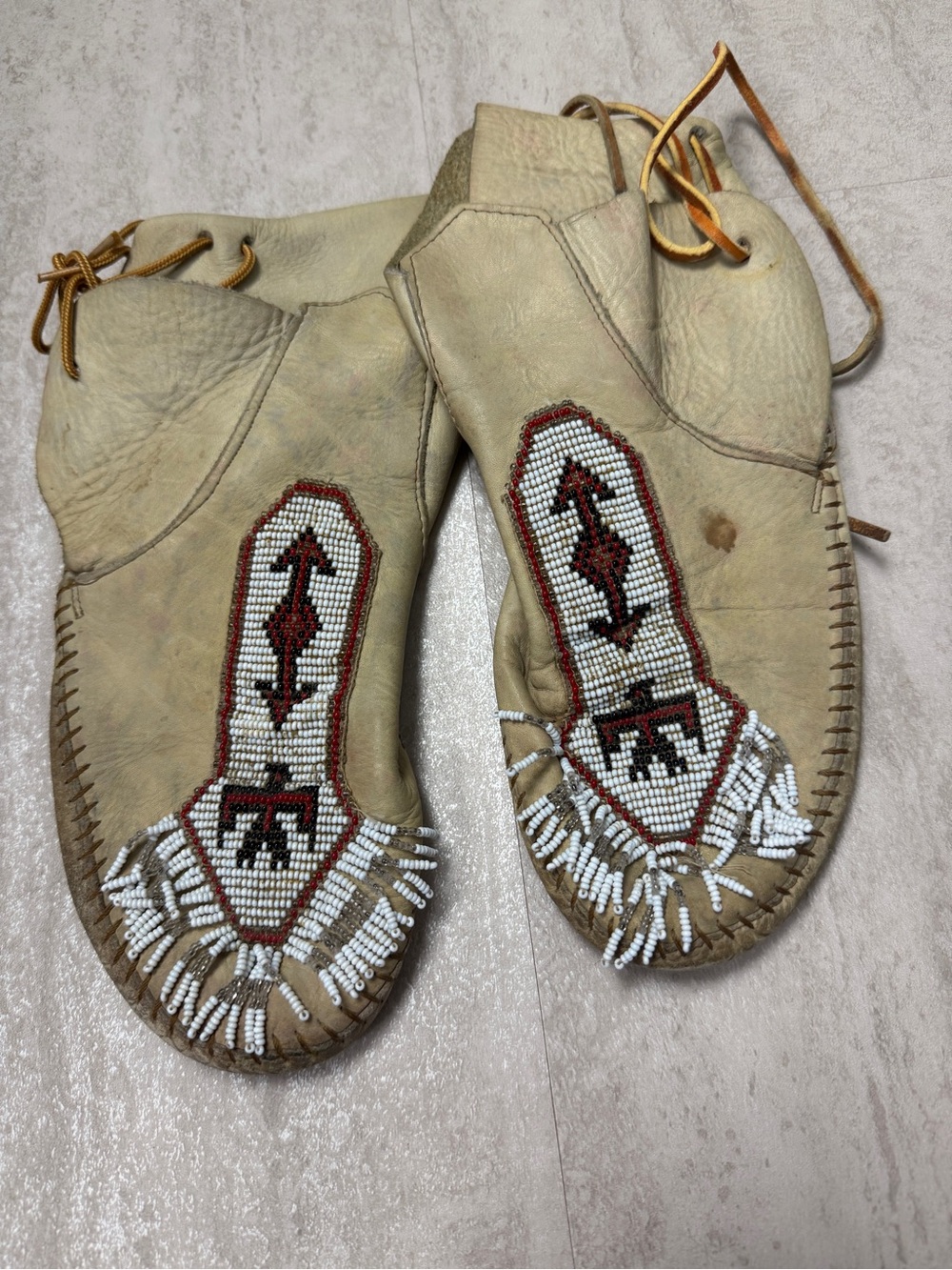 Vintage Minnetonka leather moccasins softsole thunderbird beaded moccasin boots